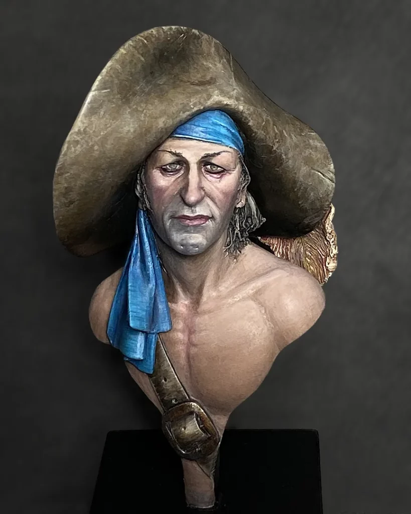 Colour photo of painted Sad pirate bust by Latorre featured in Minichix Studio article on checking contrast in miniature painting