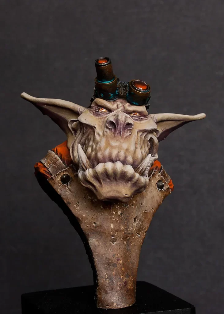 Highlighting edges - painting worn-out leather on Ein Stein's apron - miniature painting tutorial by Minichix Studio -front view