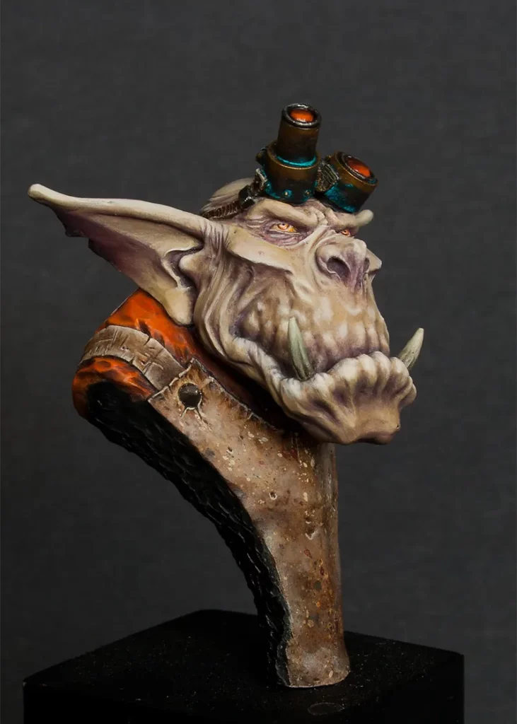 Highlighting edges - painting worn-out leather on Ein Stein's apron - miniature painting tutorial by Minichix Studio - side view