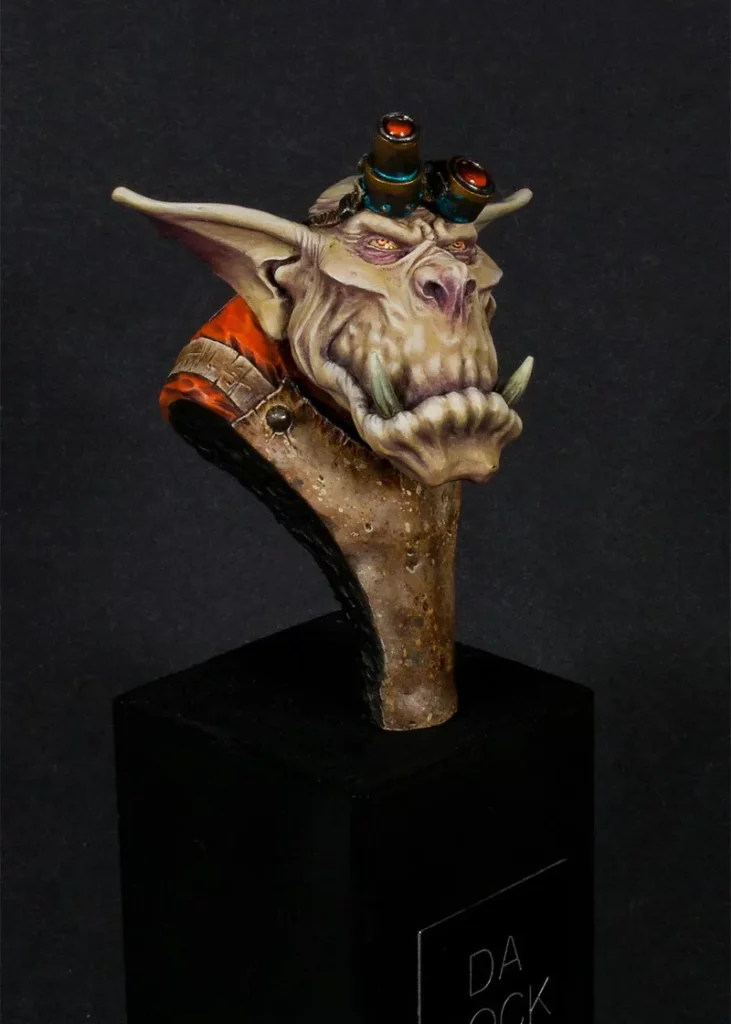 Finished Ein Stein bust - slight angle focusing on face and apron - miniature painting tutorial by Minichix Studio painting worn-out leather
