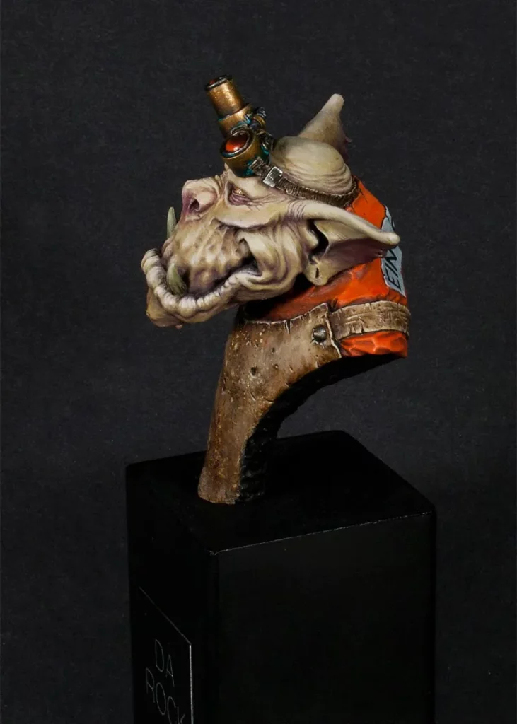 Finished Ein Stein bust - side view showing apron and googles - miniature painting tutorial by Minichix Studio painting worn-out leather