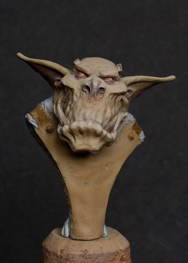 Basecoat stage of painting worn-out leather on Ein Stein's apron - miniature painting tutorial by Minichix Studio