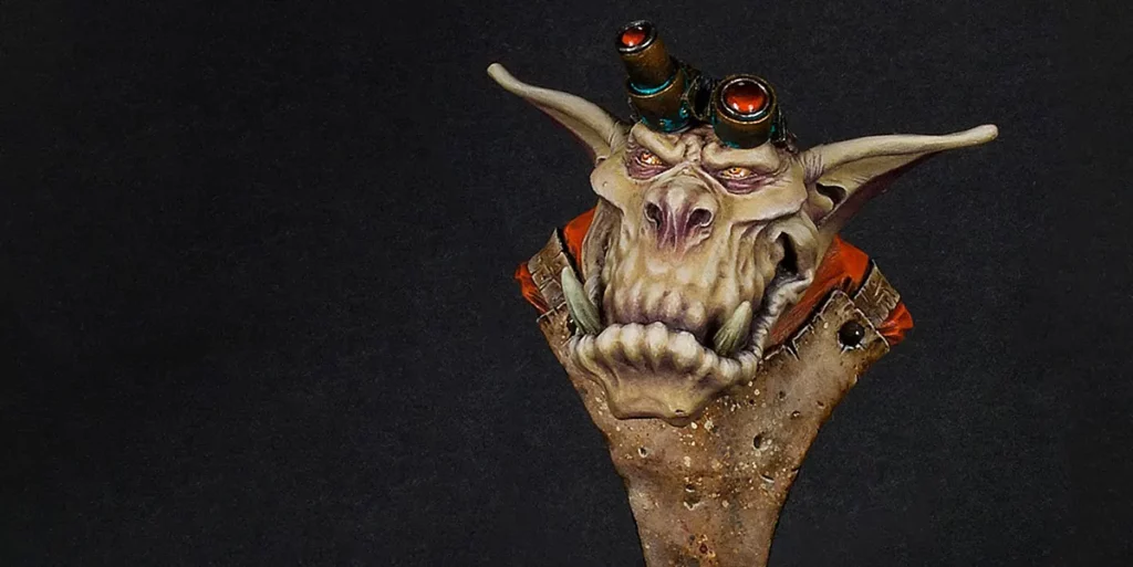Main image for a step-by-step tutorial by Minichix Studio on painting worn-out leather - featuring Ein Stein bust - an orc with and apron and googles