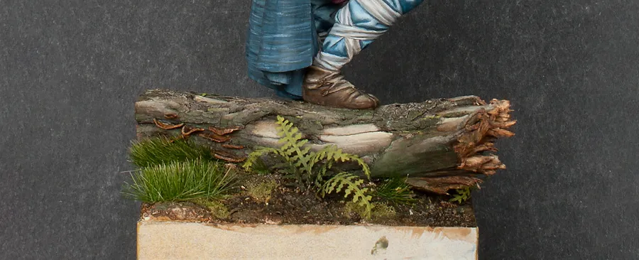 Adding rotten leaves to the scenic base - view from the other side of the base - Minichix Studio tutorial on building miniature bases.