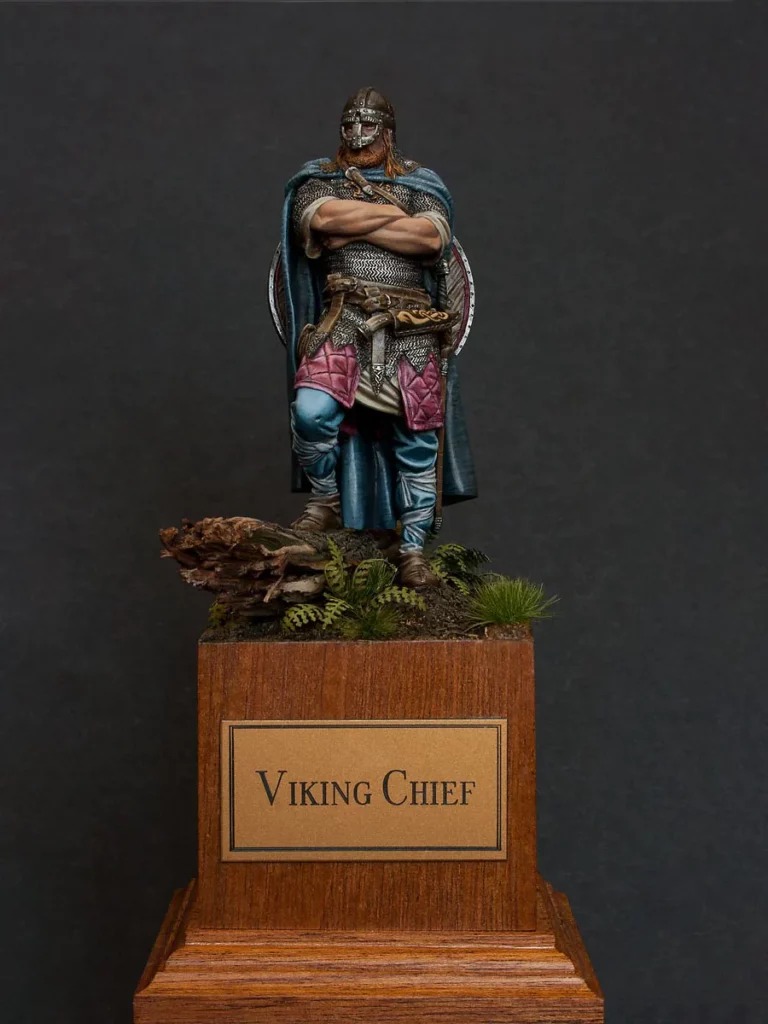 Photo of the finished Viking Chief miniature on the woodland scenic base for Minichix Studio article.