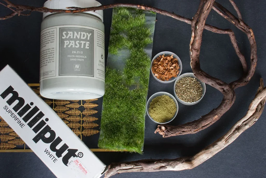 Materials used to create woodland miniature base for Viking Chief - tutorial by Minichix Studio.