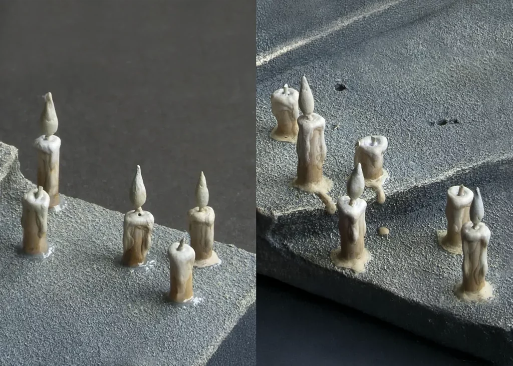 Close-up of sculpted and partly painted miniature candles on a scenic base - tutorial by Minichix Studio