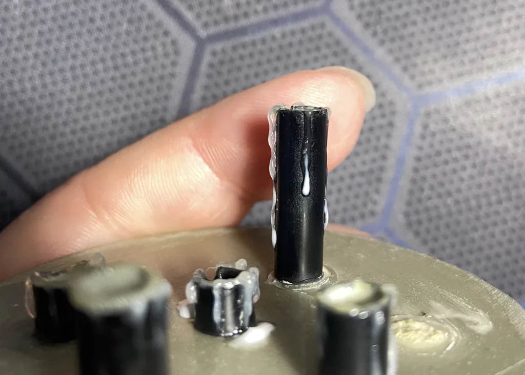 Close-up of candles with freshly applied PVA simulating melting wax - step-by-step scenic base tutorial by Minichix Studio