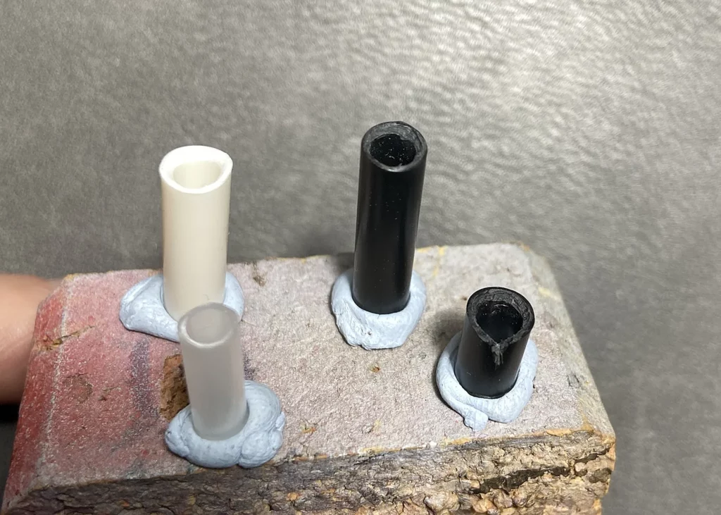 Thinning the tops of the tubes to shape miniature candles- step-by-step scenic base tutorial by Minichix Studio
