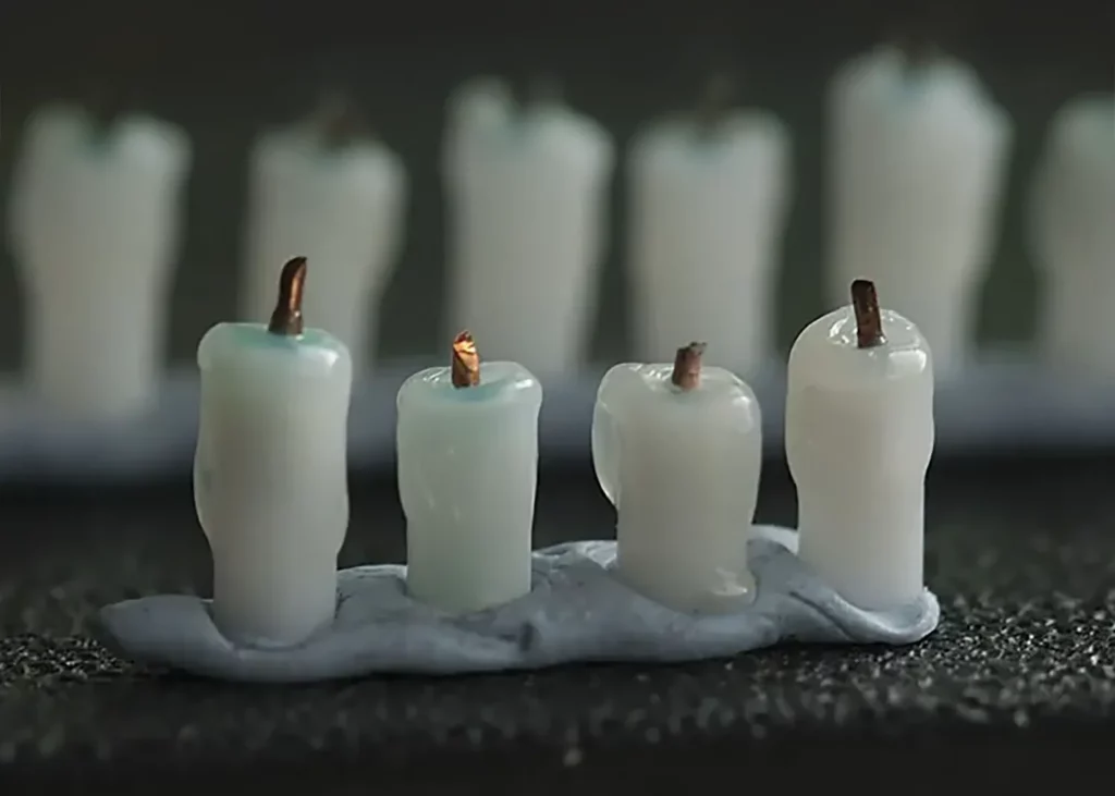Close-up of miniature candles before adding flames sculpted from Green Stuff - step-by-step tutorial by Minichix Studio