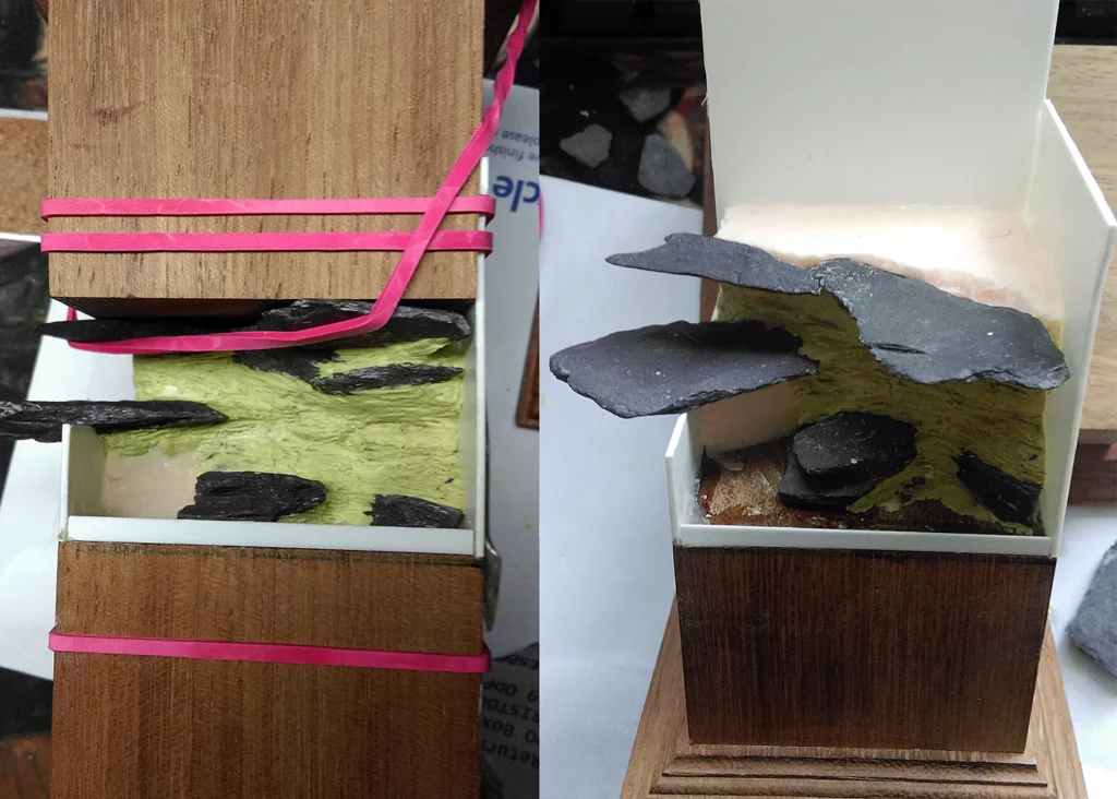 Securing stones in place using additional plinth - step-by-step miniature painting tutorial by Minichix Studio.