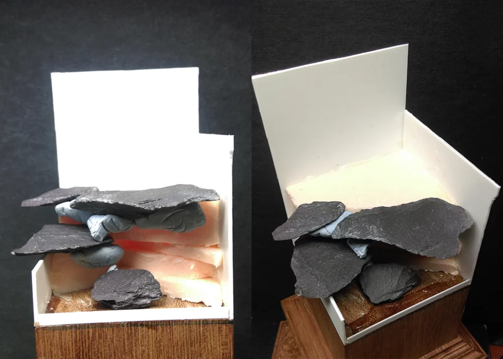 Dry-fitting stone elements to find the correct shape for the pirate base - step-by-step miniature painting tutorial by Minichix Studio.