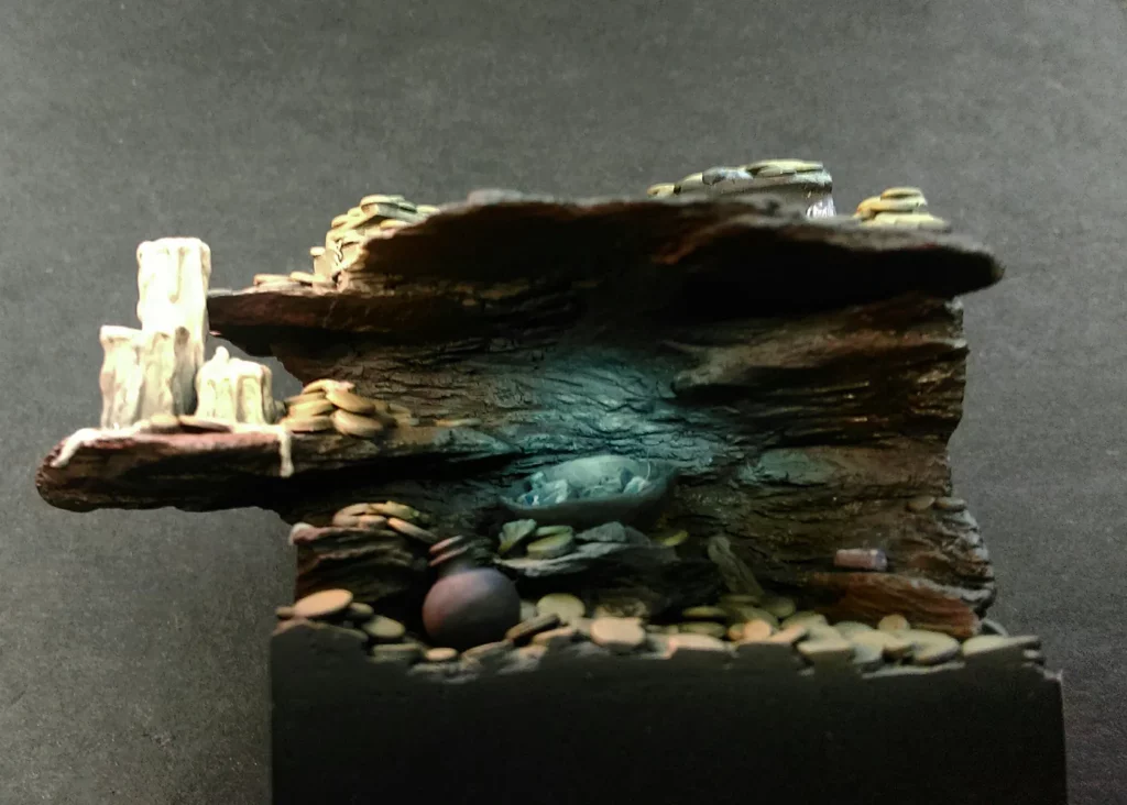 Close-up of pirate base showing glow effect - step-by-step miniature painting tutorial by Minichix Studio.