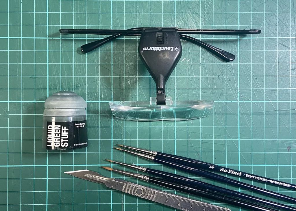 Photo of tools and materials used in creation of scars on miniatures - featured in Minichix Studio article on sculpting scars and scarifications