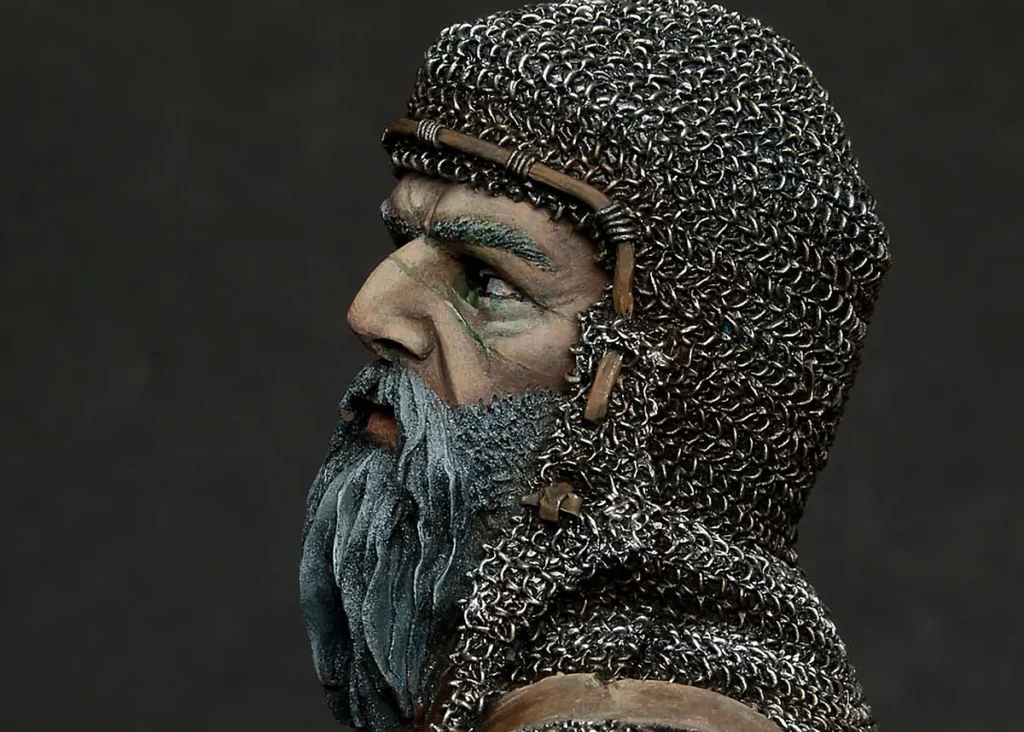 Photo of an early stage of painting on the Veteran bust with scars sculpted around his left eye - featured in Minichix Studio article on sculpting scars on miniatures.