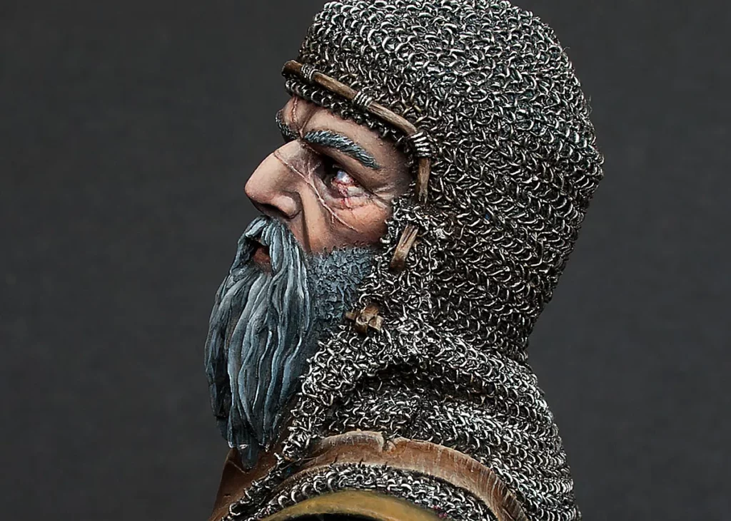 Photo of a stage in painting on the Veteran bust with scars almost finished - featured in Minichix Studio article on sculpting scars on miniatures.